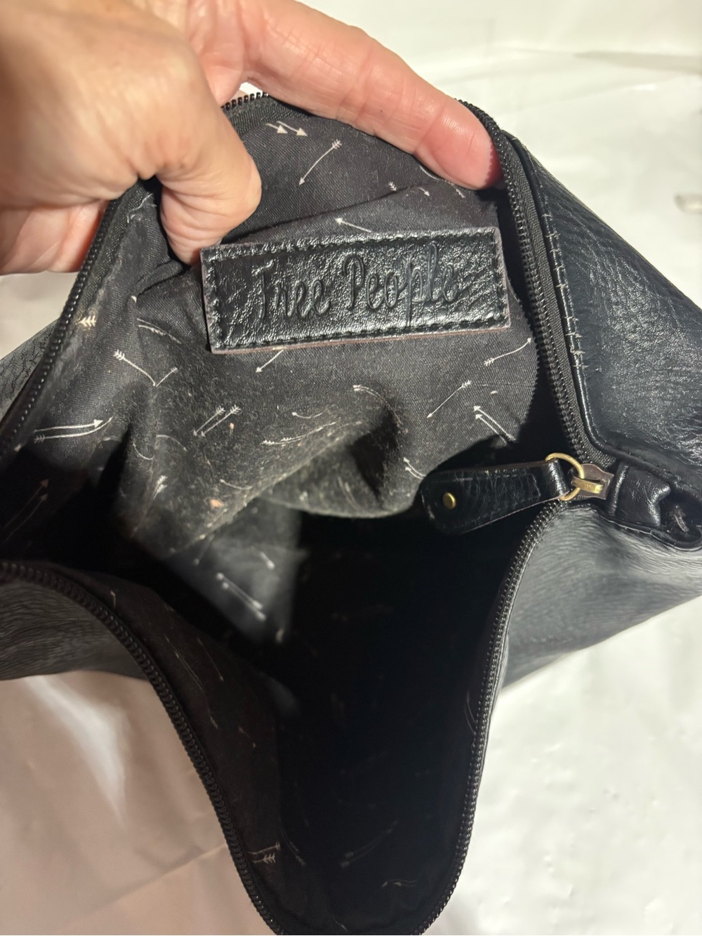 Free People Black faux Leather Cosmetic Pouch with Arrow Print Lining